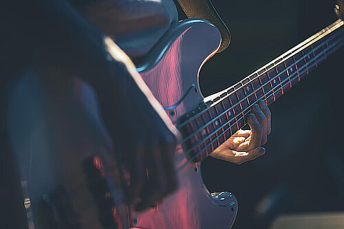 Someone playing a guitar